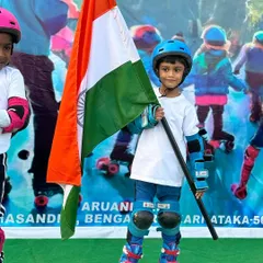 A young skater proudly holding the Indian flag at Skatethon 2024. These events are about more than just skating; they're about community and patriotism.