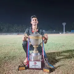 Advait celebrating with the runners-up trophy and two Man of the Match awards. A fantastic individual contribution to his team's success.