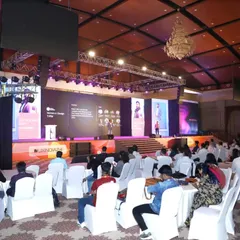 We excel at capturing the full scale of your event. This wide-angle shot of the UXINDIA 2024 summit shows the large, engaged audience and the professional stage production, demonstrating our capacity for covering major conferences.