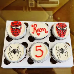 We love bringing your favorite characters to life. This custom Spider-Man themed cupcake box was for Ram's 5th birthday. It includes detailed Spider-Man masks, the iconic spider logo, and personalized touches with his name and age, all handcrafted with buttercream.