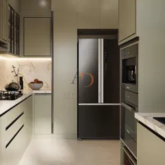A view of a sleek, modern kitchen galley with seamlessly integrated appliances, including a side-by-side refrigerator, and handleless cabinetry.