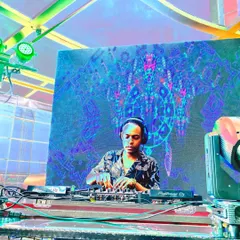 Performing with a backdrop of psychedelic visuals. My techno sets are often paired with immersive lighting and visuals to create a complete sensory experience.