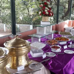 An elegant outdoor buffet arrangement with our classic brass serving pots. This setup is perfect for corporate get-togethers and celebrations in a relaxed setting.