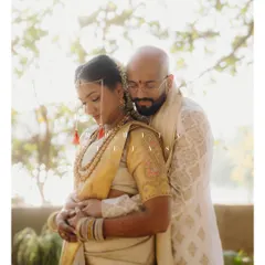 A quiet embrace between Mohita and Tejas. The soft, dreamy light and their gentle hold create a portrait that feels incredibly warm and intimate, a testament to their deep connection.