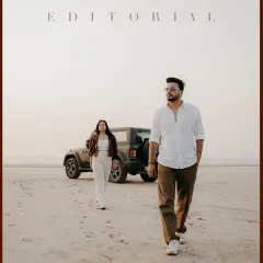 For the adventurous couple, your love story is a journey. Here, we created a modern, editorial-style shot with their Mahindra Thar on the beach, capturing their cool, free-spirited connection.