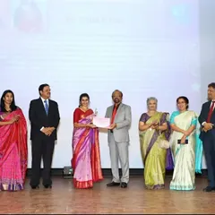 Receiving the award certificate on stage. We are thankful to FKCCI for acknowledging our efforts in the field of arts and social entrepreneurship.