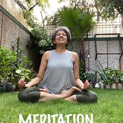 Meditating outdoors in my garden. Connecting with nature is a wonderful way to deepen your meditation practice and find peace.