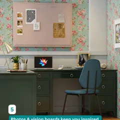 Add a personal touch to your workspace with photos and vision boards. This home office, with its vintage-style desk and floral wallpaper, is designed to keep you inspired.