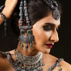For this jewellery campaign, the focus was on creating a dramatic, high-fashion look. I used a dark, intense smokey eye and a deep berry lip to complement the intricate details of the oxidised silver jewellery, making the entire look camera-ready and impactful.