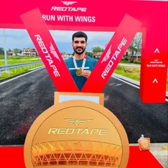 Proudly holding my finisher's medal. Every achievement, big or small, is a step forward on the fitness journey.