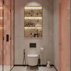 This bathroom design uses a beautiful marble-finish niche with backlighting for storing toiletries, combining functionality with high-end aesthetics.