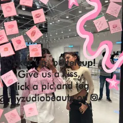 A fun mirror selfie at the Zudio Beauty launch event. The store's interactive displays, like this wall of lipstick kisses on sticky notes, are a great source of inspiration for creating a lively and engaging event atmosphere.