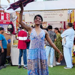 Taking my dapo for a spin at a festival. Its bright colors and flowing movement always attract smiles and curiosity. It's a simple prop with a lot of expressive potential.