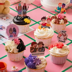 For Friendship Day, order these super fun and adorable cupcakes. They are adorned with cutouts celebrating opposite personality traits and finished with handmade edible flowers.