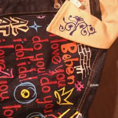 Customizing denim is always fun. This jacket is covered in colorful graffiti-style art, with words, symbols, and patterns that reflect the owner's personality.