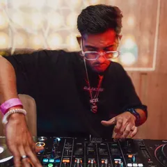 Real Trendsetter, I Don't Steal Style. A close up shot of me at the console, focused and in control. This reflects my confidence and originality as an artist.