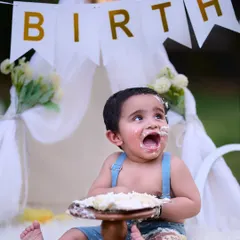 Nothing says "Happy First Birthday" like a cake smash. I love capturing the messy, delightful chaos as your little one dives into their first cake. It is a fun and memorable way to mark this huge milestone.