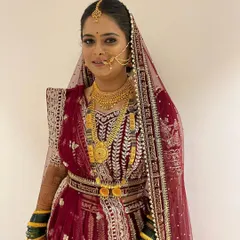 This bride is slaying in her North Indian lehenga. For her third look of the day, we went with a classic red lehenga, complete with a dupatta setting and matching jewelry.