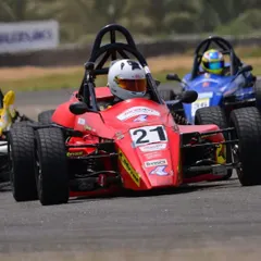 We guide drivers beyond karting. Here, one of our racers competes in the Formula LGB series, a critical step in our development program for single-seater racing careers.
