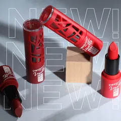 This image showcases a collection of red lipsticks with creative packaging. The composition and lighting are designed to make the products look bold and desirable for a beauty brand's campaign.