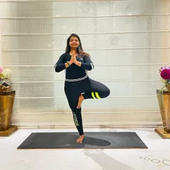 This is Vrikshasana, or Tree Pose. It's a wonderful pose for improving balance and focus. Don't forget to smile while you do it.