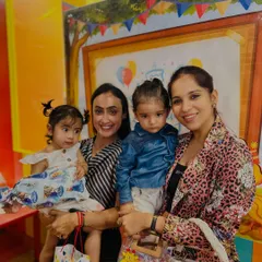 A happy moment captured with parents and children during a birthday celebration at our studio. We love it when families join in the fun.