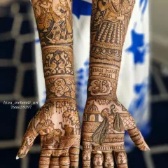 This customized bridal mehendi showcases a variety of story elements. The forearms feature portraits of Radha-Krishna and the bride's family, while the palms include a doli and elephant motifs.