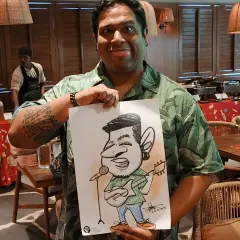 The musician from the live band was thrilled with his caricature. It's always fun to capture the performers and not just the guests at an event.
