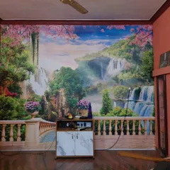 This full-wall mural creates a stunning illusion of a balcony overlooking a fantasy waterfall landscape. It dramatically opens up the room and adds a sense of depth and wonder.
