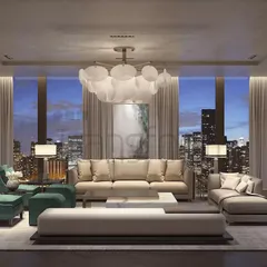 In this DLF Camellias residence, I crafted a living room that balances modern sophistication with deep comfort. The neutral palette creates a serene backdrop for the city skyline, while the plush teal accent chairs and bespoke shelving provide both personality and function.