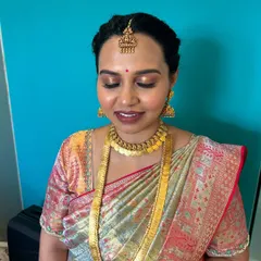 With her eyes closed, you can see the soft, metallic shimmer on the lids. This adds a touch of glamour to the look while maintaining an overall subtle and sophisticated feel.