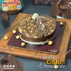 Our Nutella Gold Cheesecake is pure luxury. We combine a creamy cheesecake base with rich Nutella, then top it with roasted hazelnuts and elegant chocolate drizzles for a truly decadent experience.