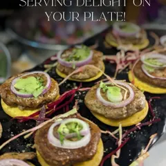 Serving delight on a plate with these mini Galouti kebabs. Served on a saffron-infused pancake (sheermal) and topped with onion, they are a taste of royal Awadhi cuisine.