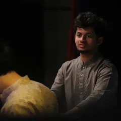 A moment of intense listening while accompanying a santoor recital. My role in sangat is to anticipate and complement the melodic artist's phrasing.