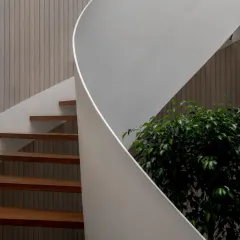 Upon entering the Hemadri penthouse, the eye is immediately drawn to the stunning helical staircase, a centerpiece that embodies contemporary elegance and structural ingenuity.