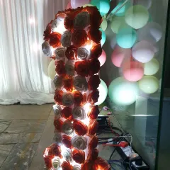 This custom-made, internally lit marquee number '1' is a standout feature for any first birthday. Covered in artificial roses, it provides a warm glow and serves as a perfect prop for milestone photos.
