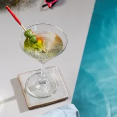 For those who like their decor "shaken, not stirred," here is my martini gel candle. It looks just like the real thing, complete with olives, and is a super fun addition to a party or a unique gift for a cocktail lover.
