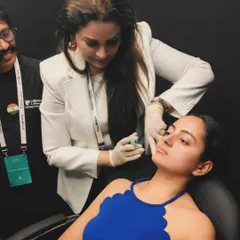 Precision is key when administering any injectable treatment. This image captures a moment during a training session for Skinvive, where I am demonstrating the injection process under the careful observation of my peers.