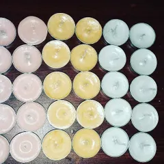 An overhead view of my tealights in pink, yellow, and white. I can provide single-color or mixed-color packs based on your needs.