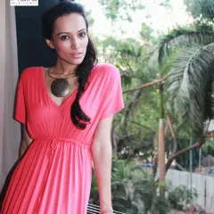 A full-length portrait of Dipannita Sharma by the window. Using the natural light and the green foliage outside created a soft, relaxed atmosphere for this beautiful shot.