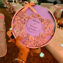 Holding up the finished wish board at the engagement party. It’s so rewarding to see my creations become a part of such happy celebrations.
