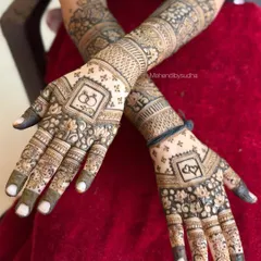 This engagement design is both symbolic and beautiful, featuring interlocking rings on the palms. The surrounding artwork is dense and intricate, perfect for a ring ceremony.