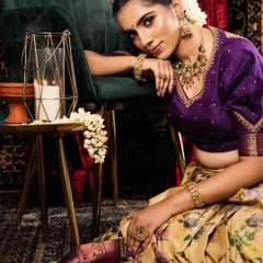 A lovely, traditional look for a festival or special occasion. This model is wearing a kemp stone set with her langa davani (half-saree).