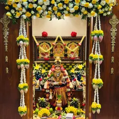 For Varamahalakshmi pooja, every detail matters. I decorated this pooja room with fragrant jasmine and tuberose garlands, lotus hangings, and beautiful yellow roses to create a truly sacred space for the goddess.