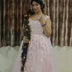 A full view of the enchanting pink gown, a lovely choice for capturing beautiful memories.