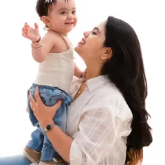 The purest laughter. This candid shot of a mother and daughter sharing a happy, playful moment is what makes a photoshoot truly special.