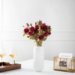 Another tablescape variation, this time styled for a romantic evening or wine night. The use of wine glasses and a warmer, more minimalist color palette creates a sophisticated and intimate mood.