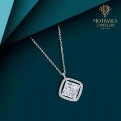 A modern and chic pendant featuring an illusion-set square of baguette diamonds, framed by round diamonds on a simple chain.