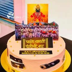 A cake I designed to celebrate Ashadhi Ekadashi, honoring the Pandharpur Wari tradition. It features edible images of Vithumauli and the Warkaris on their pilgrimage, bringing a feeling of devotion to the celebration.
