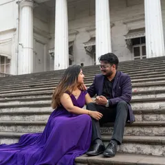 A royal purple gown for a love that feels like royalty. The long, flowing trail of this dress looks magnificent cascading down the steps for a dramatic pre-wedding picture.
